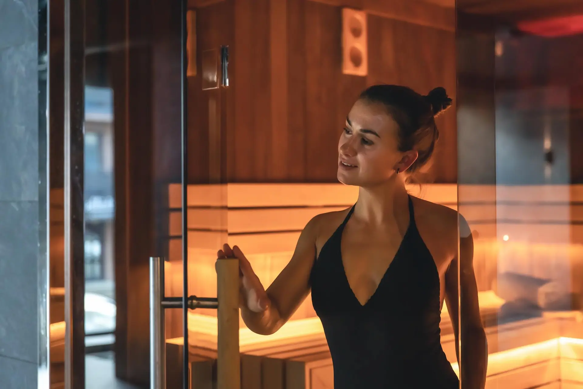 woman on her way out of a sauna